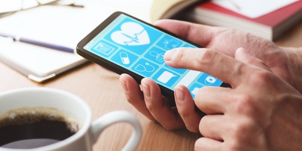 ADR205 online-healthcare-app-on-smartphone-screen-picture-id1142528978-min